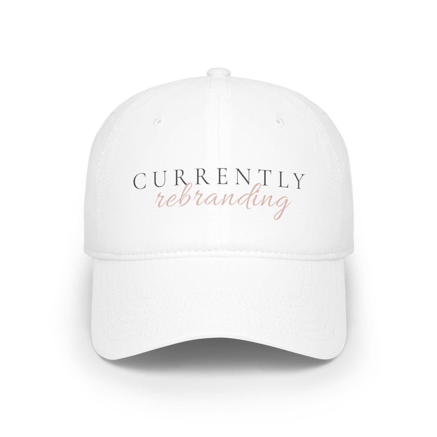 Currently Rebranding Cap | White baseball hat with script text